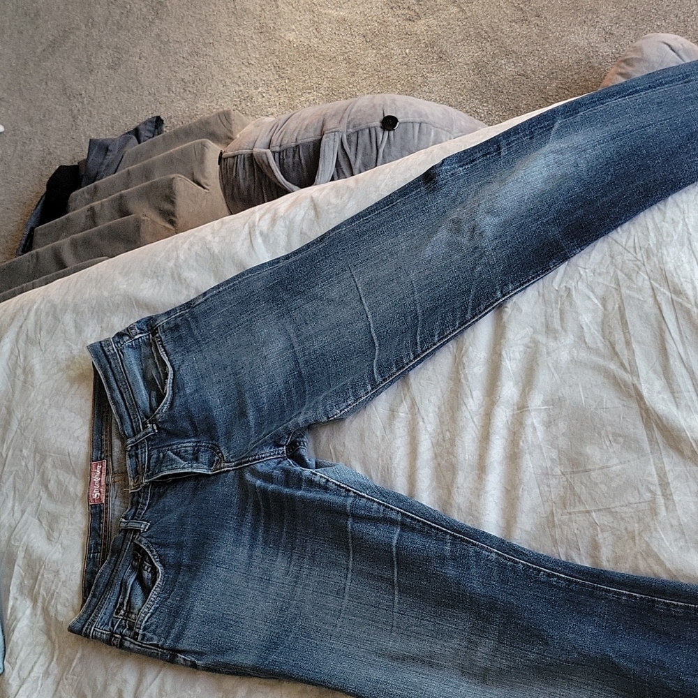 GUC men's Stronghold distressed jeans.